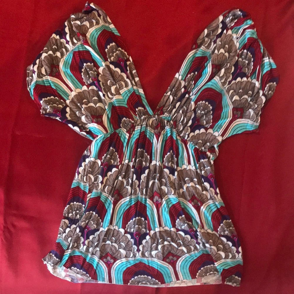 Stretchy low front low back flowy top